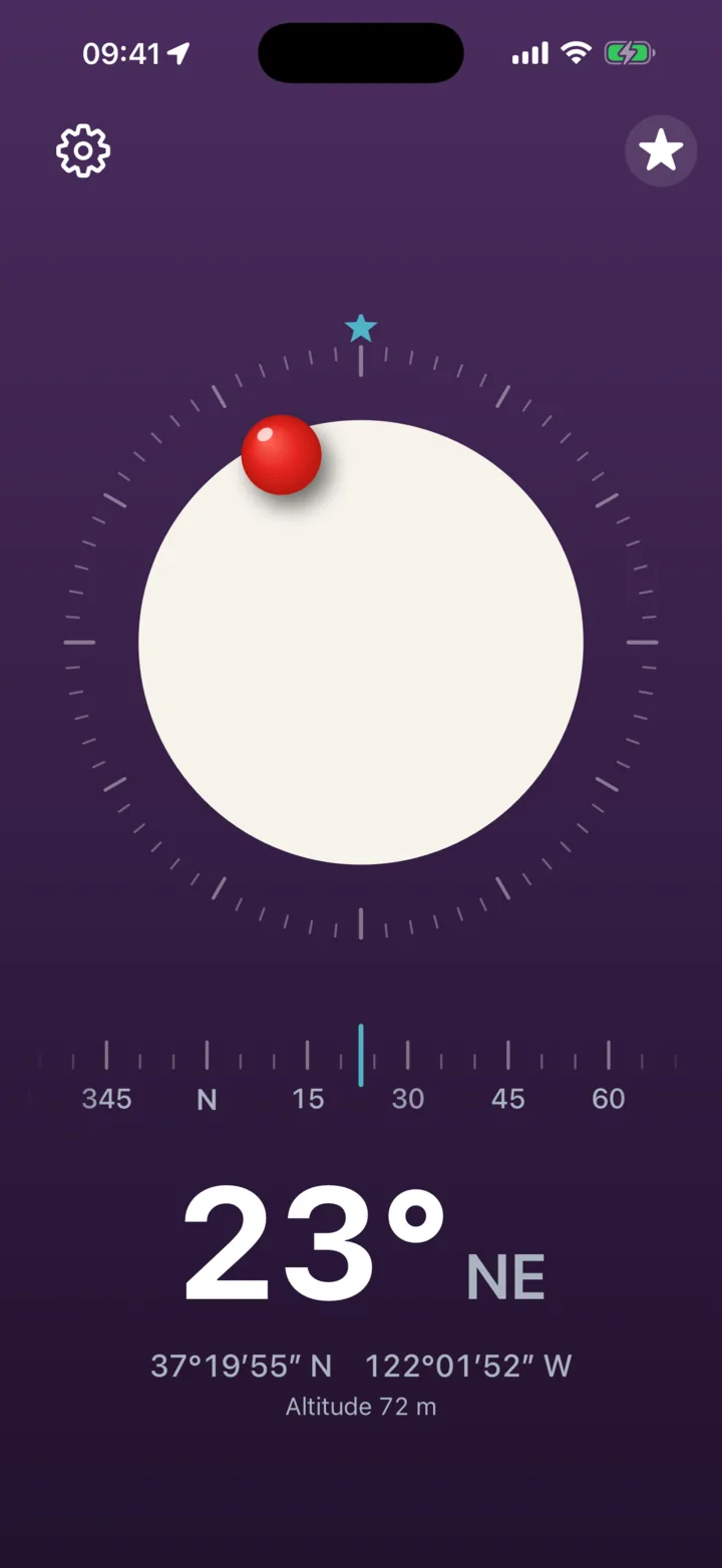 3pNorth on iPhone with the Disc face on the Plum background: a white disc with a red ball toward north, heading 23 degrees north-east
